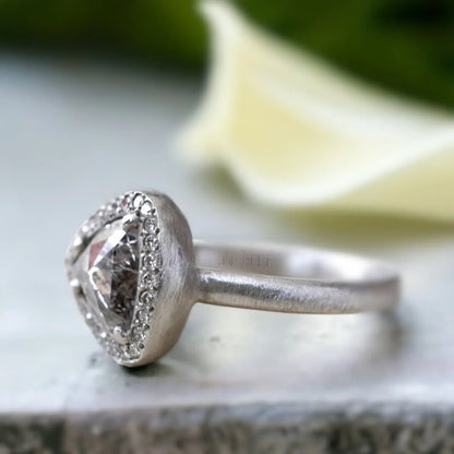 Natural Salt and Pepper Diamond Ring Triangle Cut Halo Design featuring a rose pear-cut salt and pepper diamond surrounded by a round diamond halo in a nature-inspired halo ring design with a straight shank and artisan handcrafted styling.