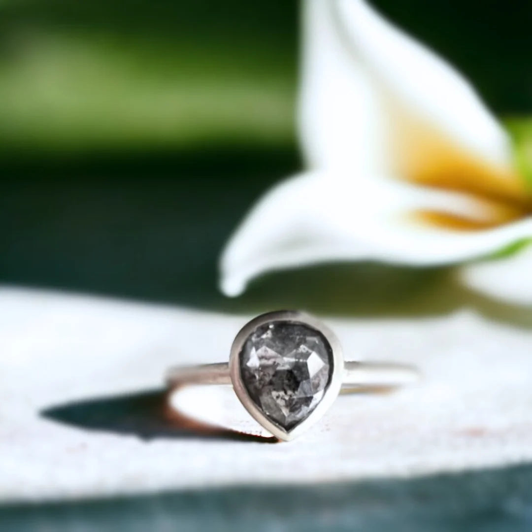 Natural Salt and Pepper Diamond Ring with Rose Pear Cut Design featuring a 0.72 CT rose pear-cut salt-and-pepper diamond in a minimalist engagement ring style with a straight shank band and clean, refined silhouette.