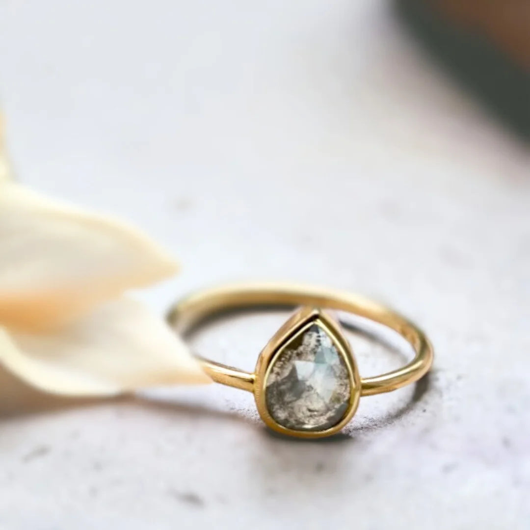 Natural Salt and Pepper Diamond Ring Pear Cut Solitaire featuring a 0.75 CT rose pear-cut salt-and-pepper diamond in a solitaire setting with a straight shank band and minimalist contemporary ring design.