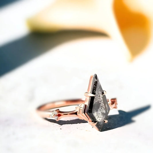 Natural Salt-and-Pepper Kite Diamond Ring with Art Deco Design featuring a kite-cut salt-and-pepper diamond center stone, geometric Art Deco-inspired design, round side diamonds, split-shank band, and handcrafted engagement ring styling.