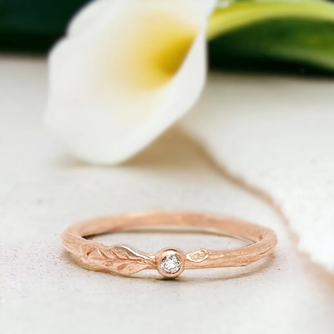 Natural White Diamond Ring Minimalist Stacking Design featuring a round cut natural white diamond on a slim straight shank band with a delicate minimalist stacking ring style and timeless everyday elegance.