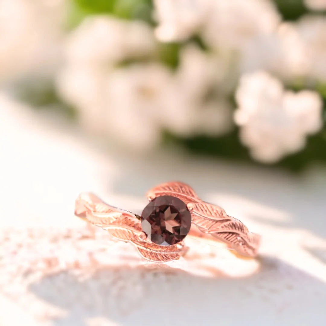Nature-inspired Alexandrite Ring Hand-Engraved Organic 0.83 Ct Ring featuring a round-cut 0.83 CT natural sapphire with warm earthy brilliance and a sleek straight band with organic handcrafted detailing and minimalist fine jewellery styling.