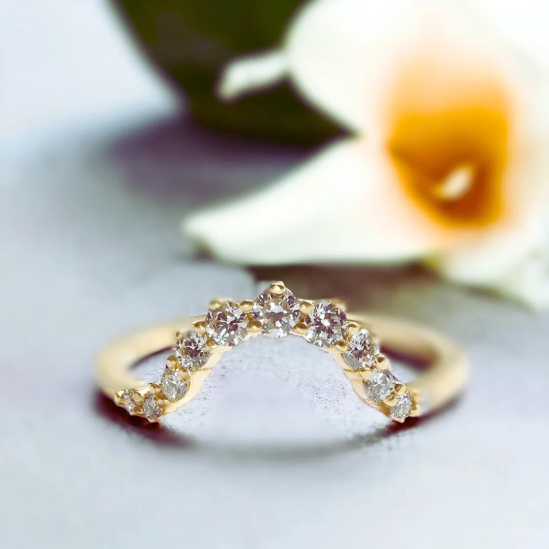 Oval Salt-and-Pepper Diamond Ring with Accent Diamond Band featuring a rose oval-cut salt-and-pepper diamond center stone with round grey accent diamonds on a diamond accent band in a handcrafted statement ring design.