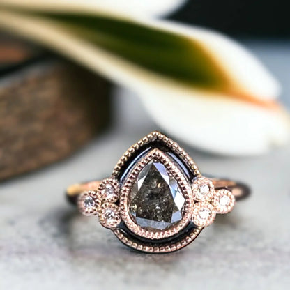 Pear Shape Salt and Pepper Diamond Ring Cathedral Custom Style Jewelry featuring a pear-cut salt-and-pepper center diamond with organic natural inclusions, accented by round side stones, set in a cathedral-inspired design with a straight shank band and refined engagement ring style.