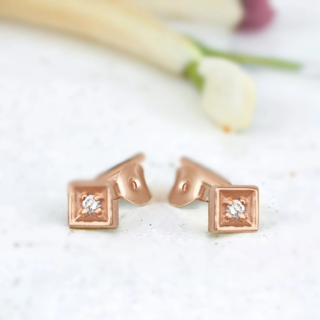 Square diamond stud earrings featuring petite round-cut natural diamonds set in solid rose gold with a minimalist and elegant handcrafted design for everyday luxury wear.