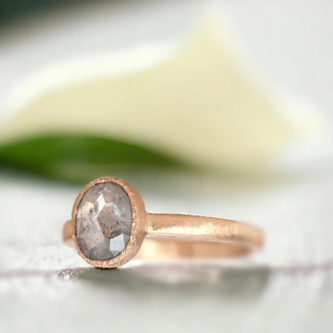 Rose Elongated Cushion Salt and Pepper Diamond Ring 2.30 CT featuring a natural rose elongated cushion-cut salt-and-pepper diamond in a handcrafted statement ring design with a straight shank band, organic layered setting, and artisan-finished detailing.