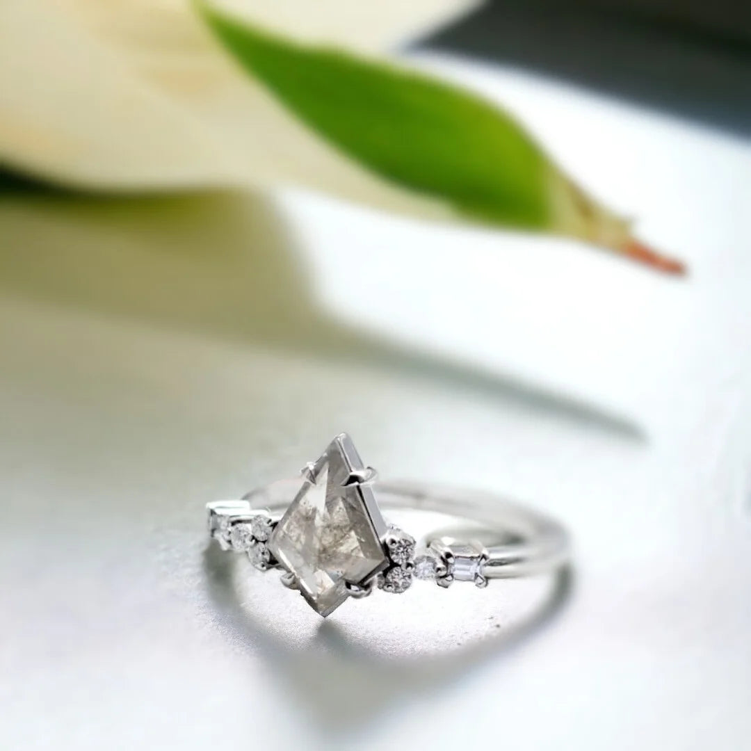 Salt And Pepper Diamond Engagement Ring Kite Cut Design featuring a 0.90 CT kite cut salt and pepper diamond with baguette and round accent diamonds in a geometric engagement ring style with a straight shank band and modern rustic design.