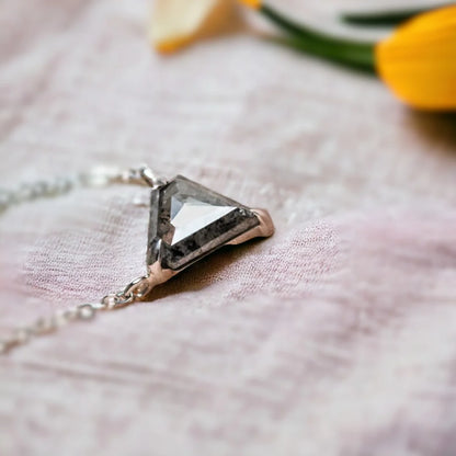 Salt And Pepper Diamond Necklace Step Grace Cut Pendant featuring a natural Step Grace cut salt and pepper diamond in a minimalist geometric pendant design suspended from a delicate chain, showcasing unique organic inclusions and a modern statement style.
