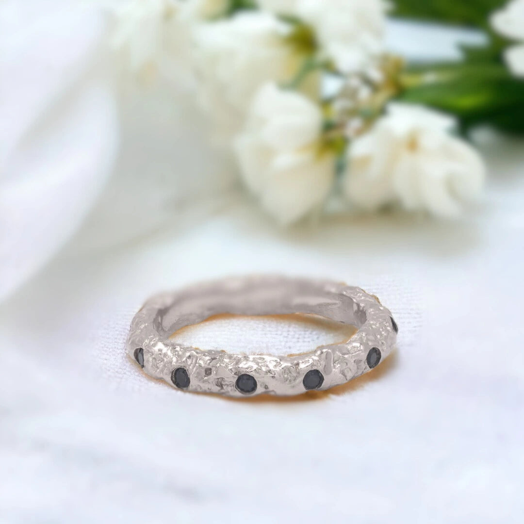 Salt and Pepper Diamond Ring Gold Foil Blue Sapphire Stacking Rings featuring round-cut salt-and-pepper diamonds with white diamond accents in a gold stacking ring design with dual bands and a straight shank setting.