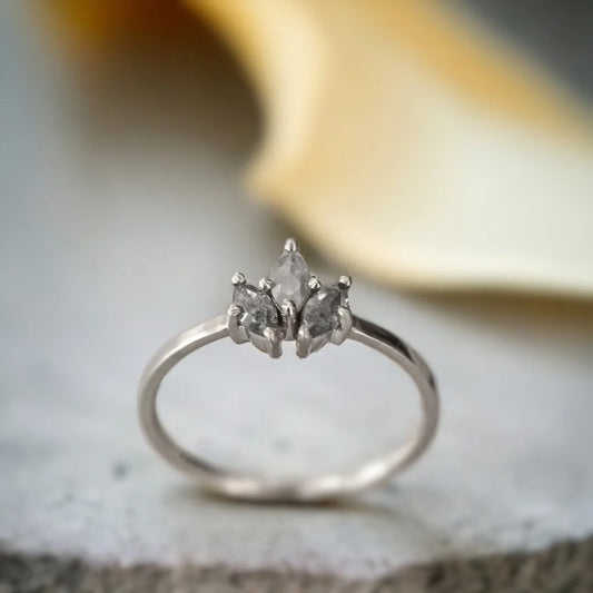 Salt and Pepper Diamond Ring Marquise Solitaire Design featuring a natural marquise-cut salt-and-pepper diamond in a solitaire setting with a straight shank band and minimalist, vintage-inspired ring style.