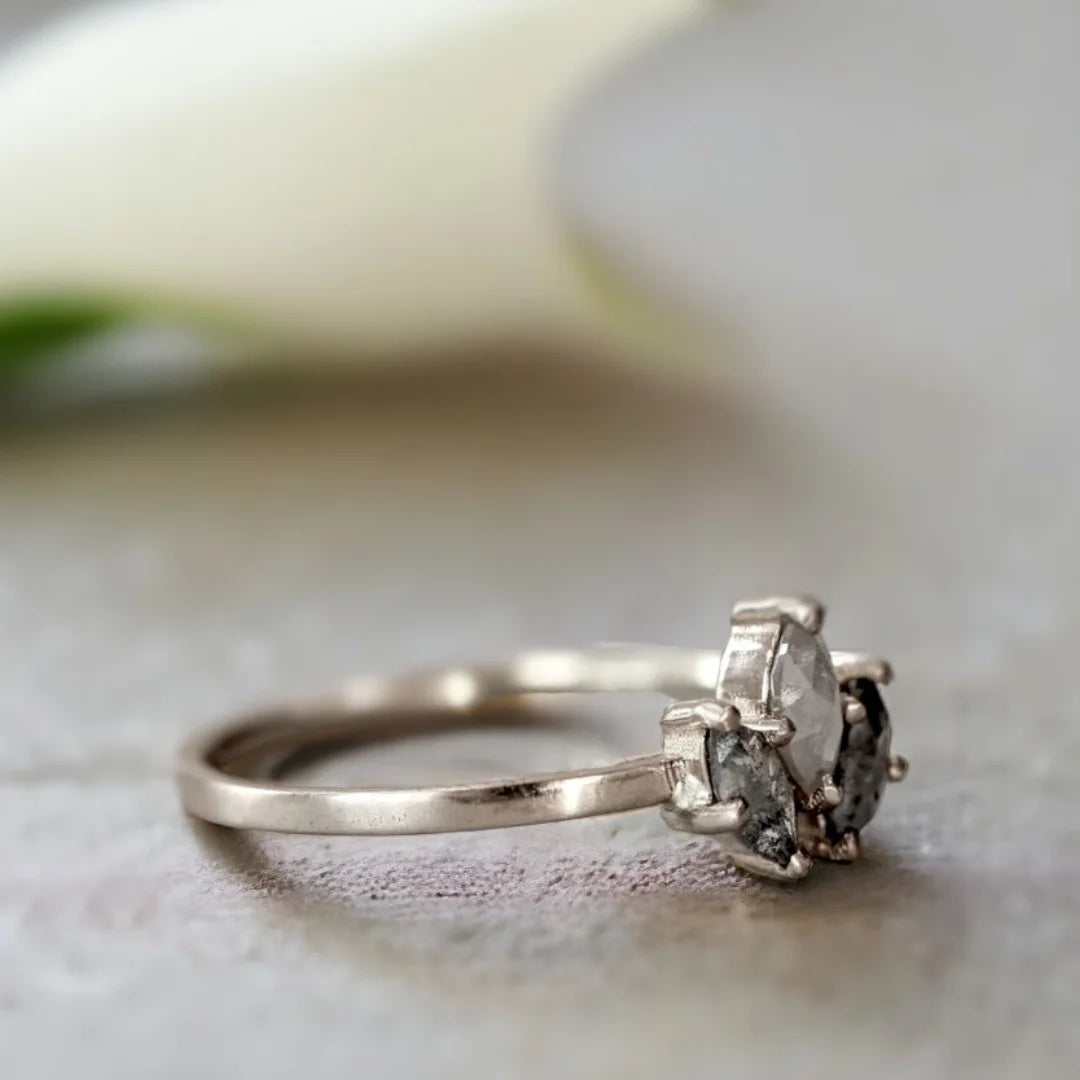 Salt and Pepper Diamond Ring Marquise Solitaire Design featuring a natural marquise-cut salt-and-pepper diamond in a solitaire setting with a straight shank band and minimalist, vintage-inspired ring style.