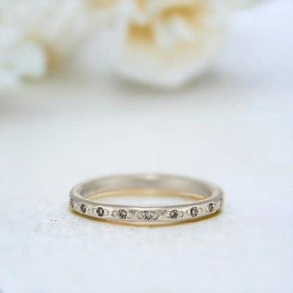 Salt and Pepper Diamond Ring with Zig Zag Half Eternity Design featuring a round-cut salt and pepper diamond in a minimalist half eternity ring with a slim straight shank