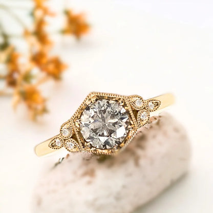 Salt and Pepper Diamond Ring Vintage-inspired Handmade Bespoke Design featuring a round-cut natural salt and pepper diamond center stone with round accent diamonds in a vintage-inspired bespoke ring style.