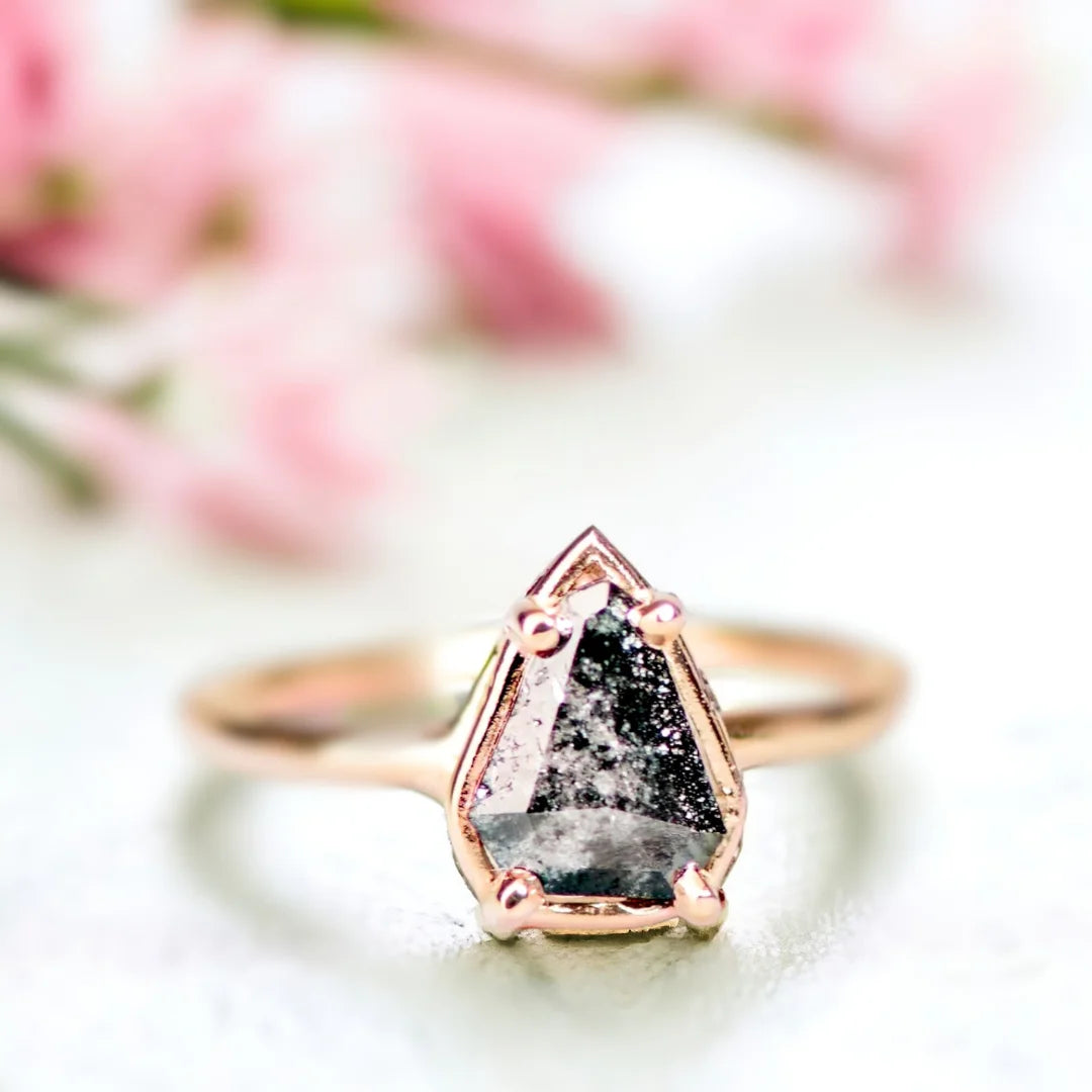 Salt and Pepper Diamond Ring Shield Cut 1.10 Ct Minimalist Ring featuring a shield-cut 1.10 ct natural salt and pepper diamond set on a slim straight band with minimalist geometric styling and visible organic inclusions in a refined handcrafted design