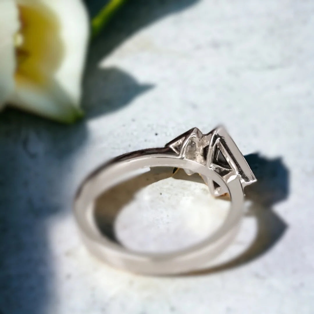 Salt and Pepper Diamond Ring Double Shield Diamond Design featuring a 1.18 CT shield-cut salt-and-pepper diamond with grey shield-shaped side diamonds in a geometric statement ring design with a straight shank band.