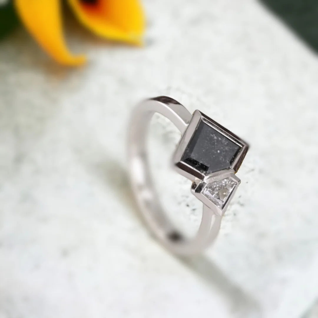 Salt and Pepper Diamond Ring Double Shield Diamond Design featuring a 1.18 CT shield-cut salt-and-pepper diamond with grey shield-shaped side diamonds in a geometric statement ring design with a straight shank band.