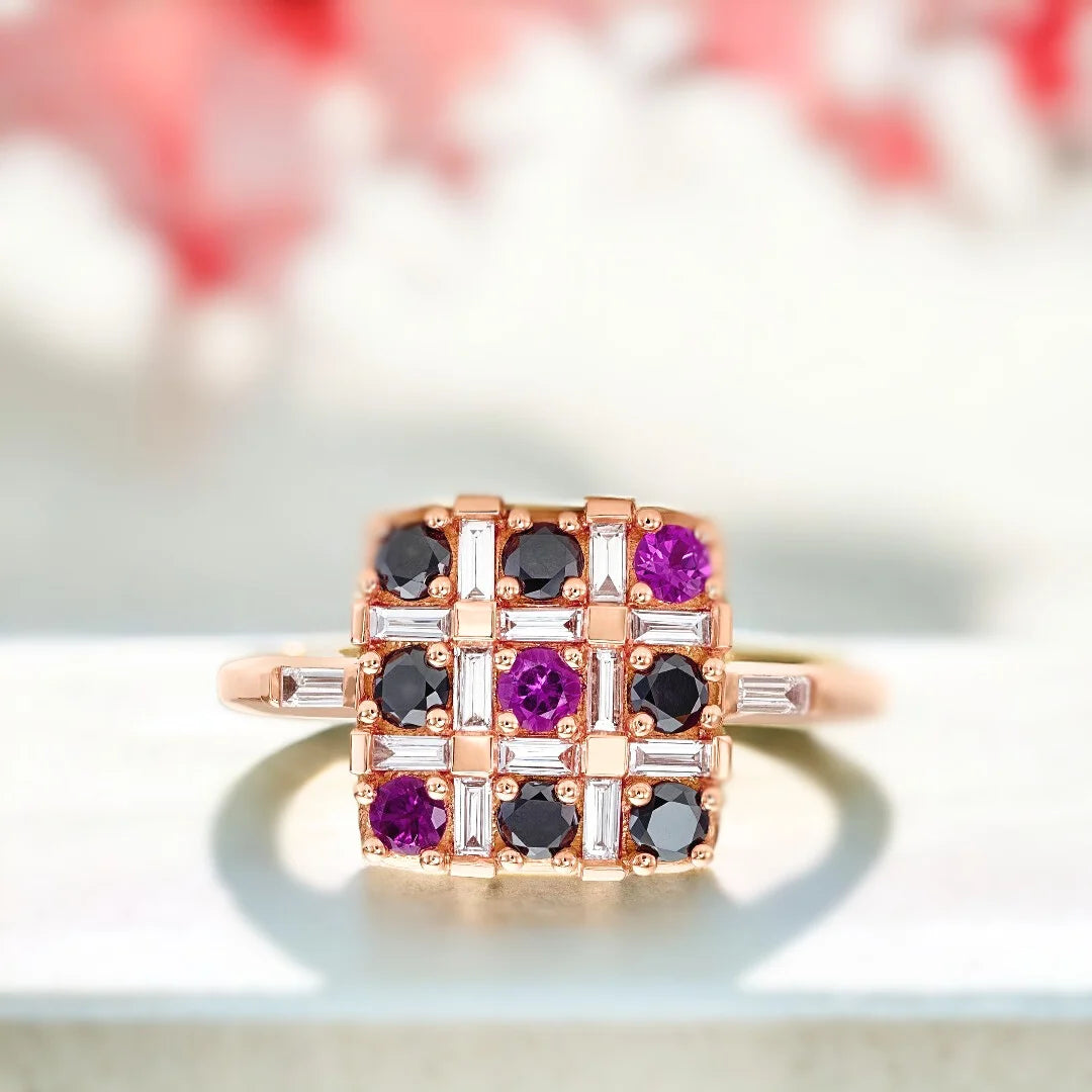 Salt and Pepper Multi Diamond Ring XO Black Diamond Pink Ruby Design featuring a baguette-cut salt-and-pepper diamond focal stone, round black diamond accents, ruby detailing, and a slim straight shank 1.75mm band with a modern mixed gemstone design and white diamond accents