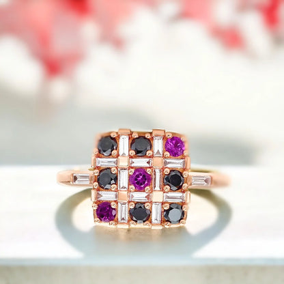 Salt and Pepper Multi Diamond Ring XO Black Diamond Pink Ruby Design featuring a baguette-cut salt-and-pepper diamond focal stone, round black diamond accents, ruby detailing, and a slim straight shank 1.75mm band with a modern mixed gemstone design and white diamond accents