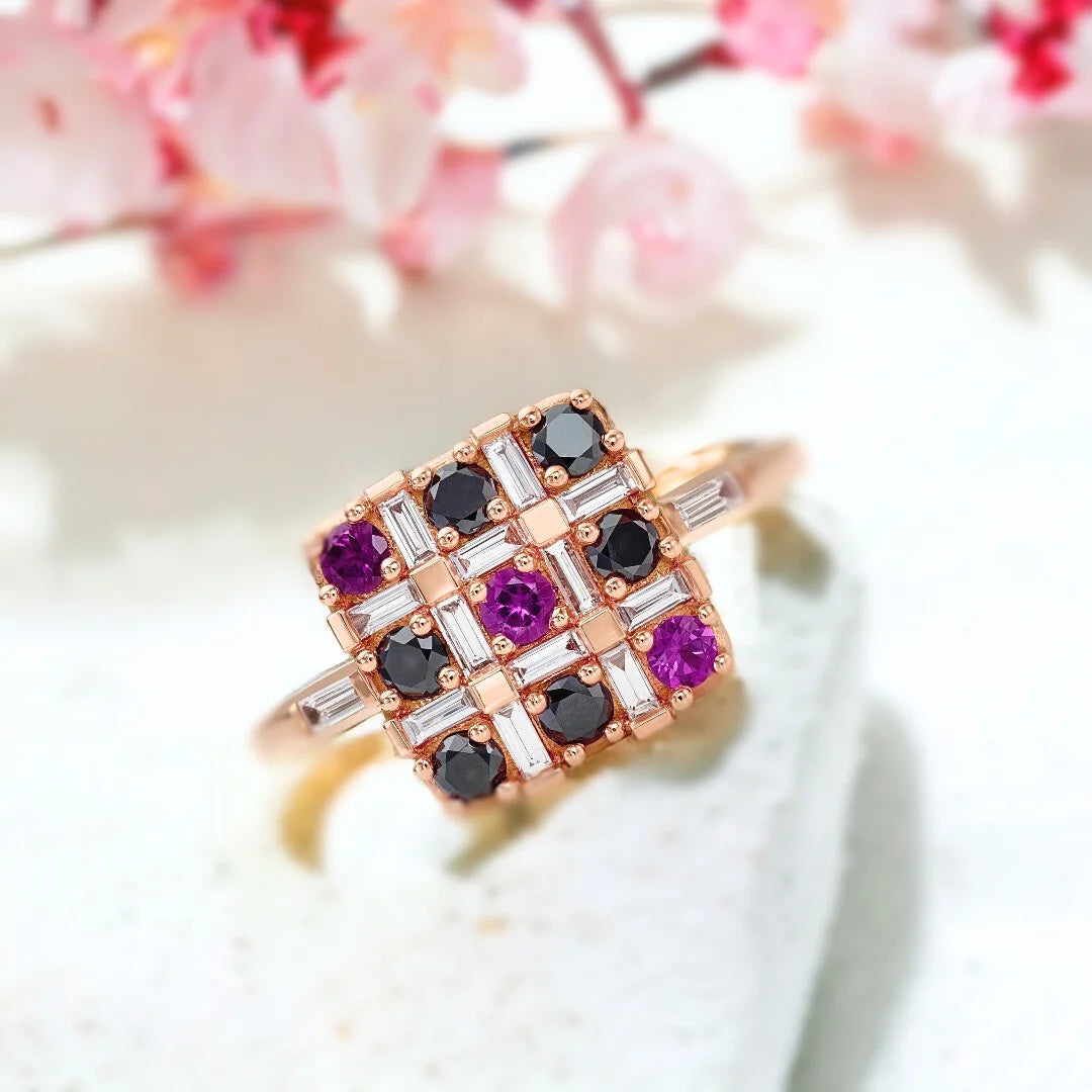 Salt and Pepper Multi Diamond Ring XO Black Diamond Pink Ruby Design featuring a baguette-cut salt-and-pepper diamond focal stone, round black diamond accents, ruby detailing, and a slim straight shank 1.75mm band with a modern mixed gemstone design and white diamond accents