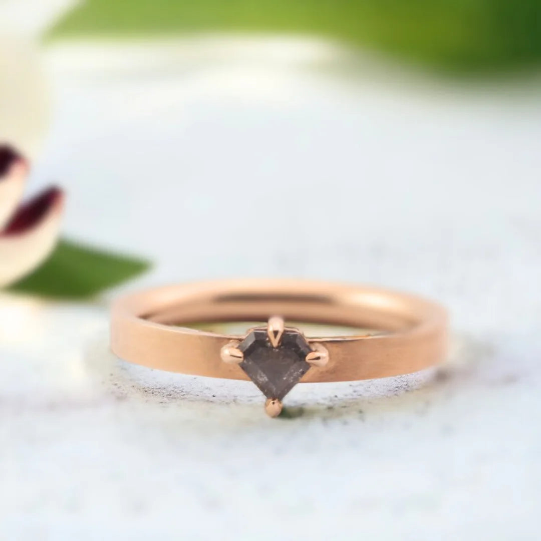 Salt and Pepper Shield Cut Diamond Ring Nebula Raindrop Design featuring a shield-cut salt and pepper diamond set in a minimal straight shank band with geometric modern styling and handcrafted artisan detailing.