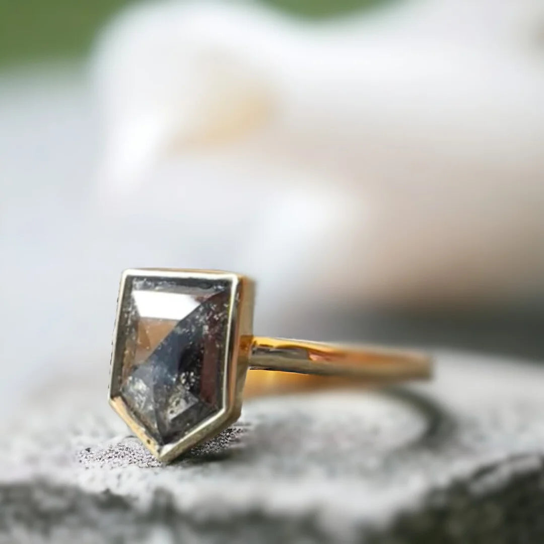 Shield Salt and Pepper Diamond Ring Amethyst Shield Cut Design featuring a shield-cut salt-and-pepper diamond with 1.28 ct center stone set in a geometric minimalist design with straight shank band and refined artisan craftsmanship