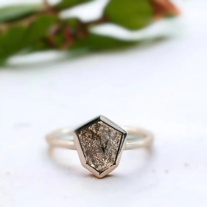 Shield Salt And Pepper Diamond Ring With 1.35 CT Shield Cut Stone featuring a natural shield cut salt and pepper diamond in a solitaire setting with a straight shank band and modern minimalist ring design.