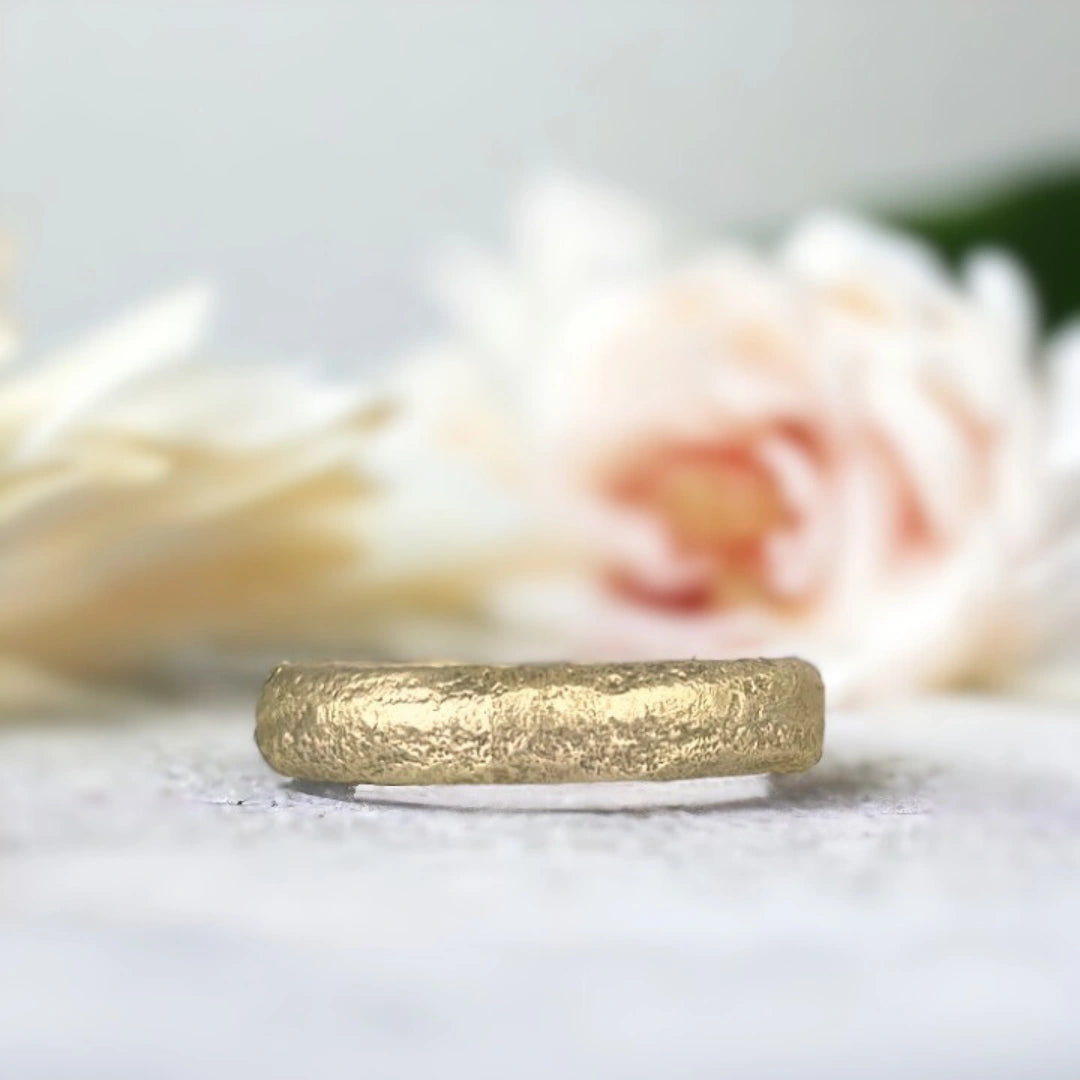 Solid Gold Band Ring San José Wedding Band Inspired Cartagena Treasure featuring a solid gold finish with a 5.00 mm band width, straight shank structure, and organic handcrafted textured surface in a minimalist wedding band design