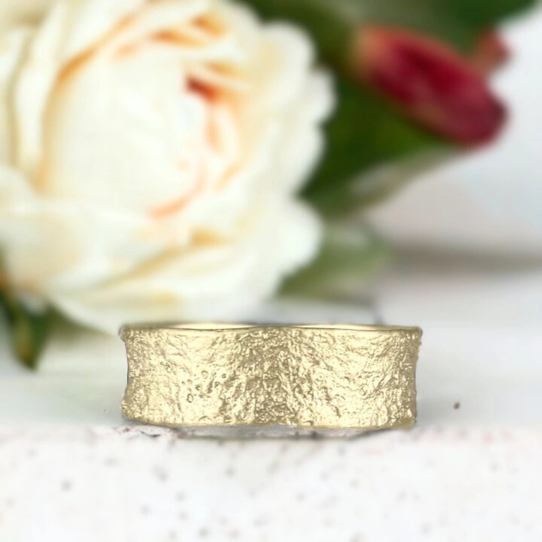 Sands of Time Wedding Band with Ocean Wave Design Solid Gold Wedding Band featuring a 7.5mm wide solid gold band with ocean wave-inspired layered handcrafted texture, straight shank design and smooth comfort fit unisex statement style ring