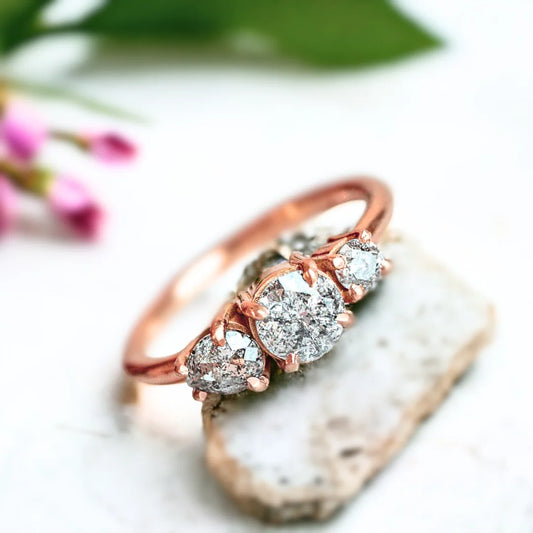 Vintage Trilogy Salt and Pepper Diamond Ring With Round Cut Trio featuring a round-cut grey-toned salt-and-pepper diamond in a trilogy setting with round and pear-cut side stones, vintage-inspired fine diamond ring with a straight shank design and handcrafted detailing.