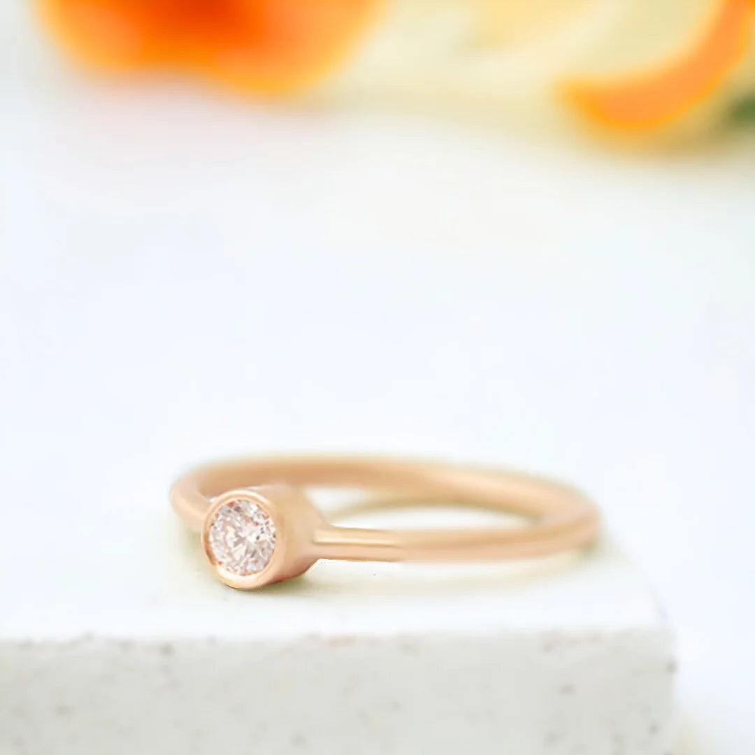 Yellow Gold Diamond Solitaire Ring Minimalist 0.55 CT White Diamond featuring a round brilliant-cut white diamond set in polished yellow gold with a slim band and clean, straight shank solitaire design